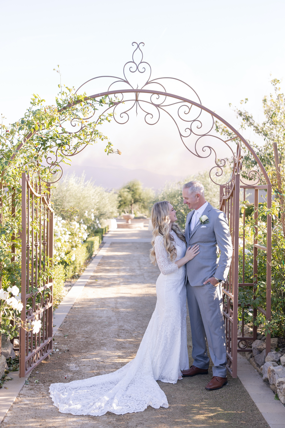 Tuscan Rose Ranch wedding bride and groom portrait.