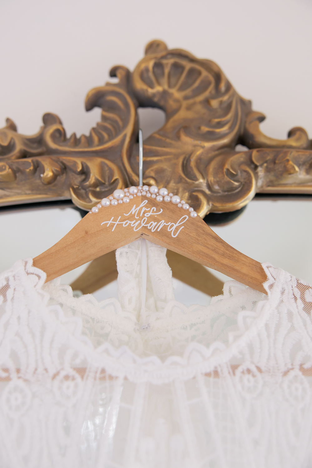 Custom wooden bridal hanger with pearls. 