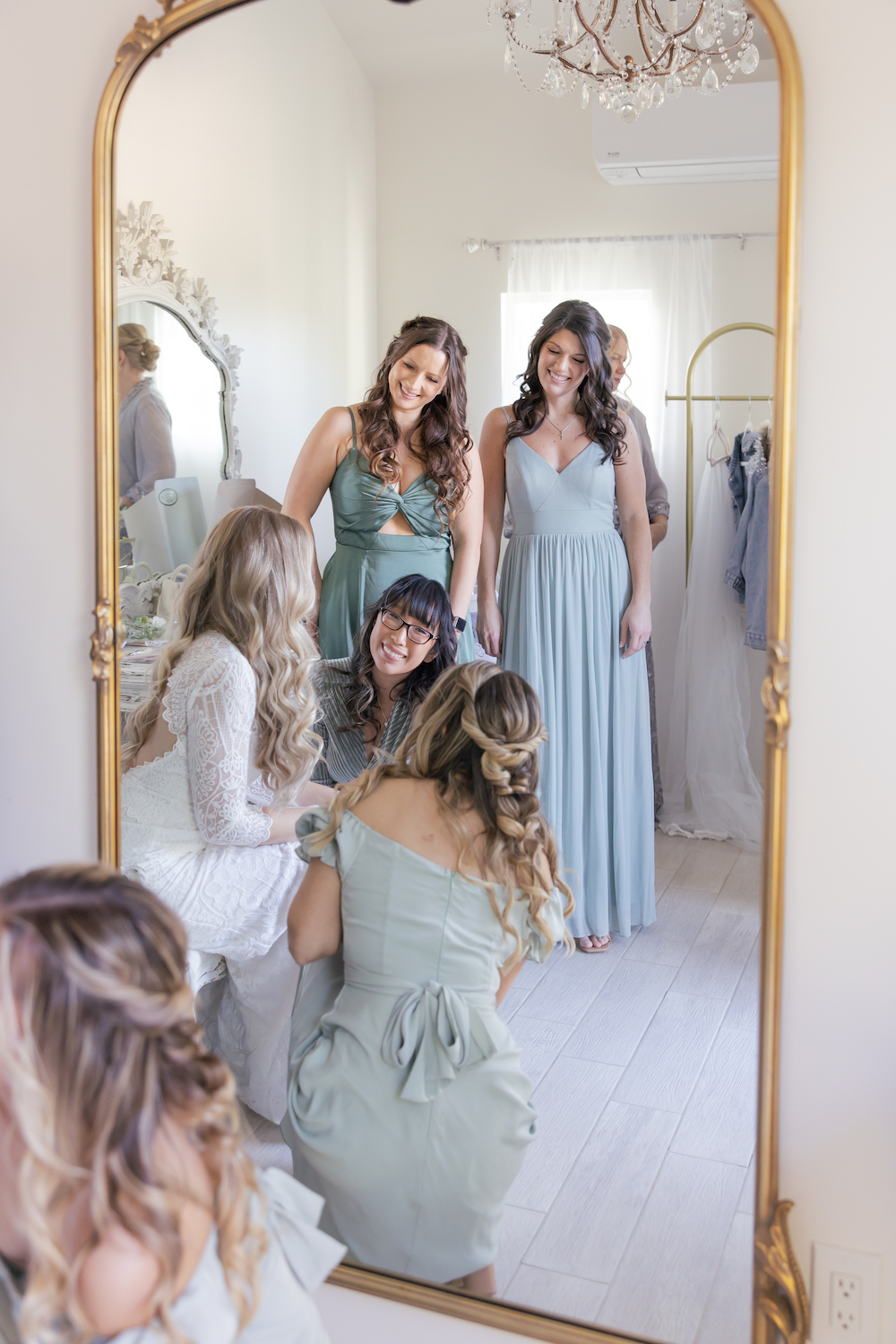 Bride and bridesmaids getting ready in the Tuscan Rose Ranch bridal suite. 